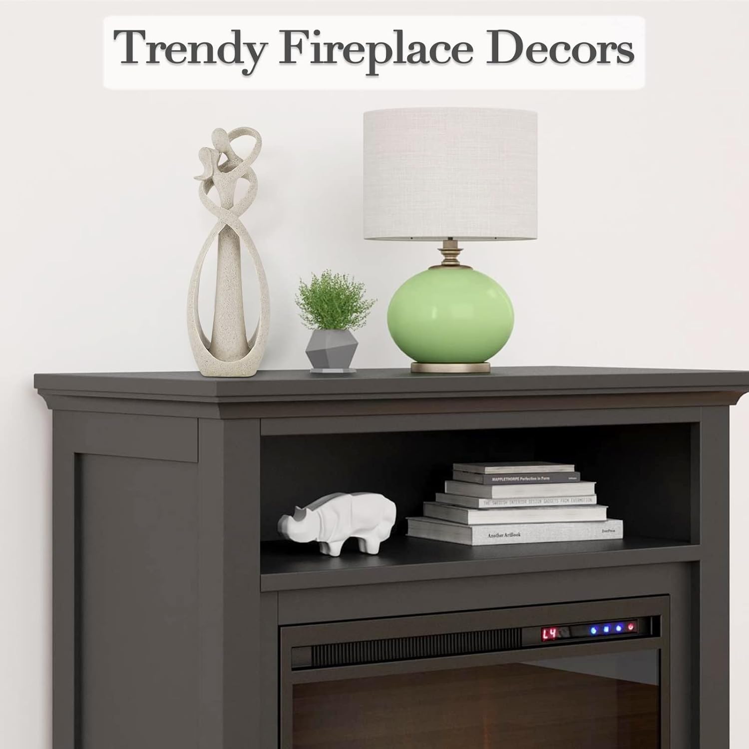 Showcases trendy decorative items to style a fireplace mantel or electric fireplace unit, inspiring customers with modern decor options.