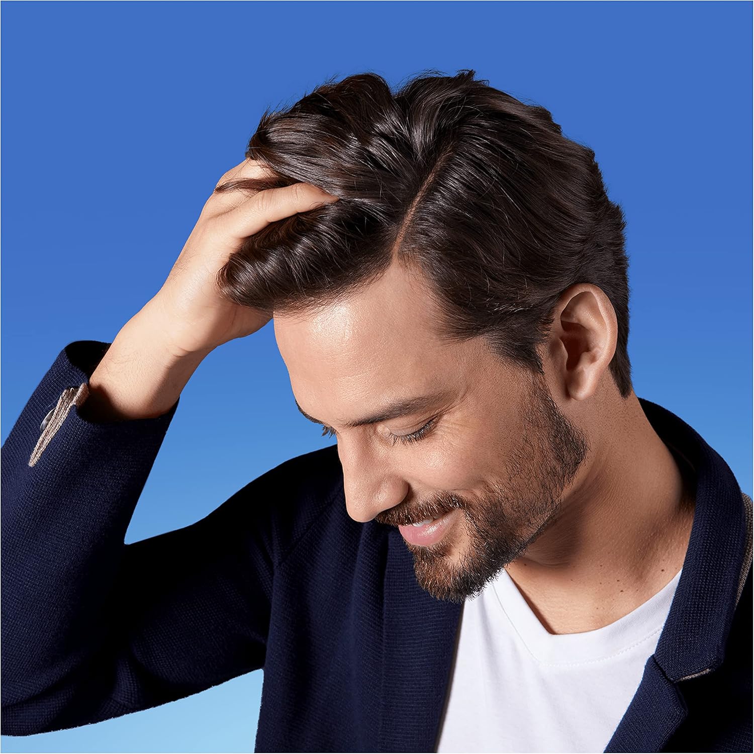 Showcases the product's ability to promote healthy, full-looking hair.