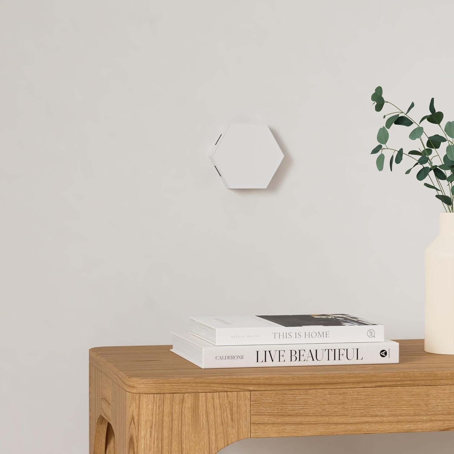 Showcases the product in a clean, modern home setting to appeal to design-conscious consumers.