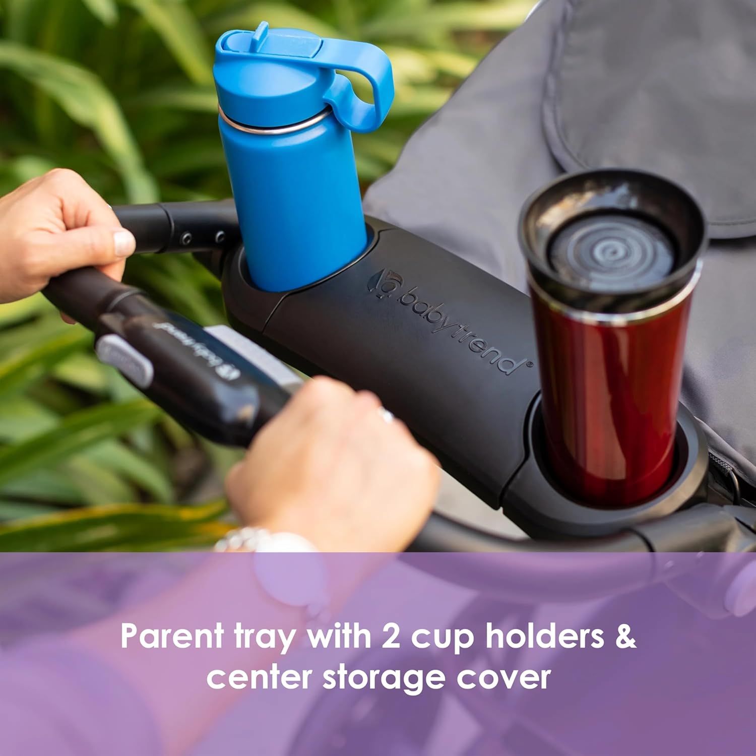 Demonstrates how the product can be used to conveniently hold drinks while using a stroller, enhancing the parent's on-the-go experience.