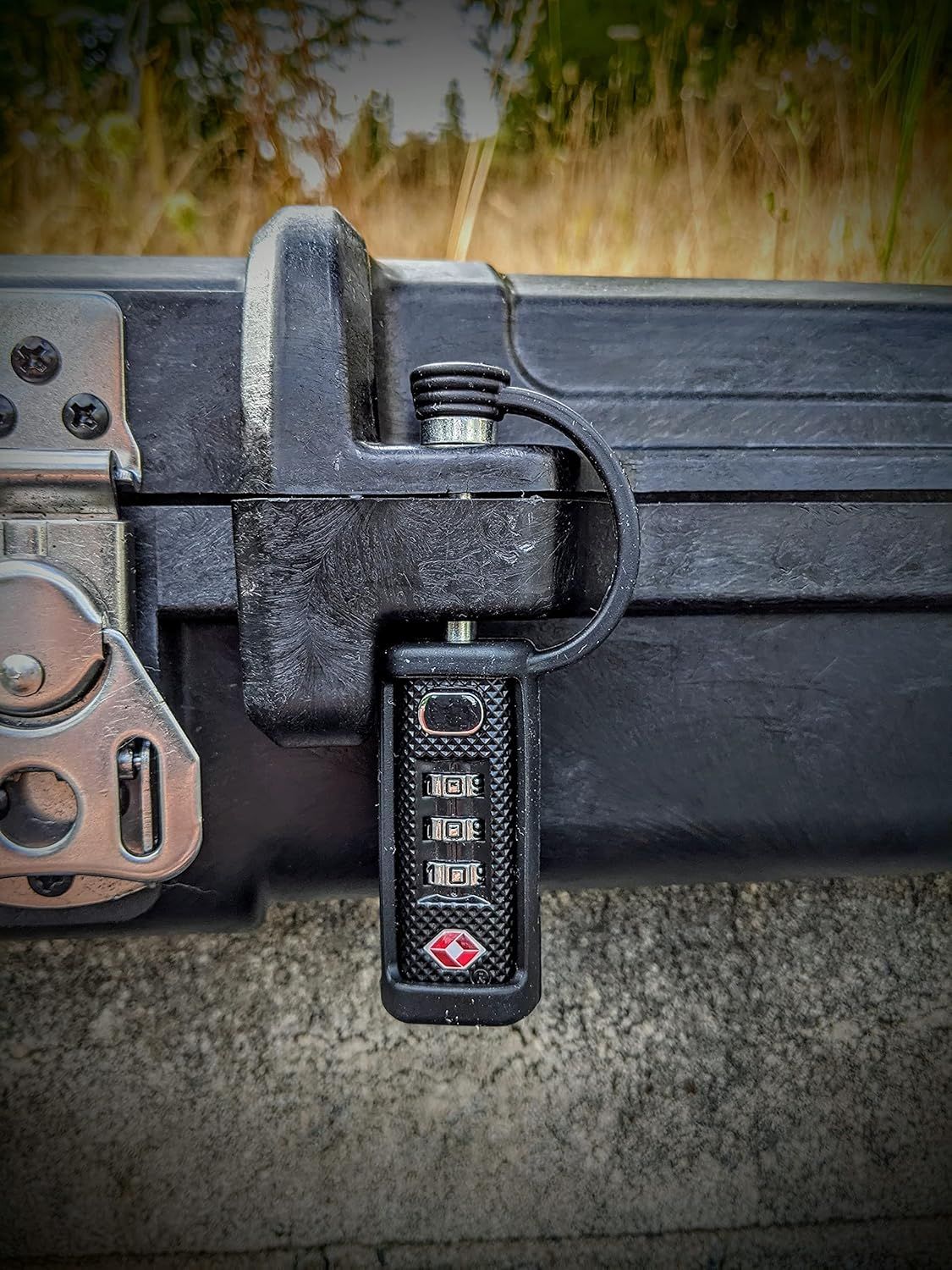 Demonstrates the luggage's built-in TSA-approved combination lock to reassure travelers that their belongings can be secured during travel.
