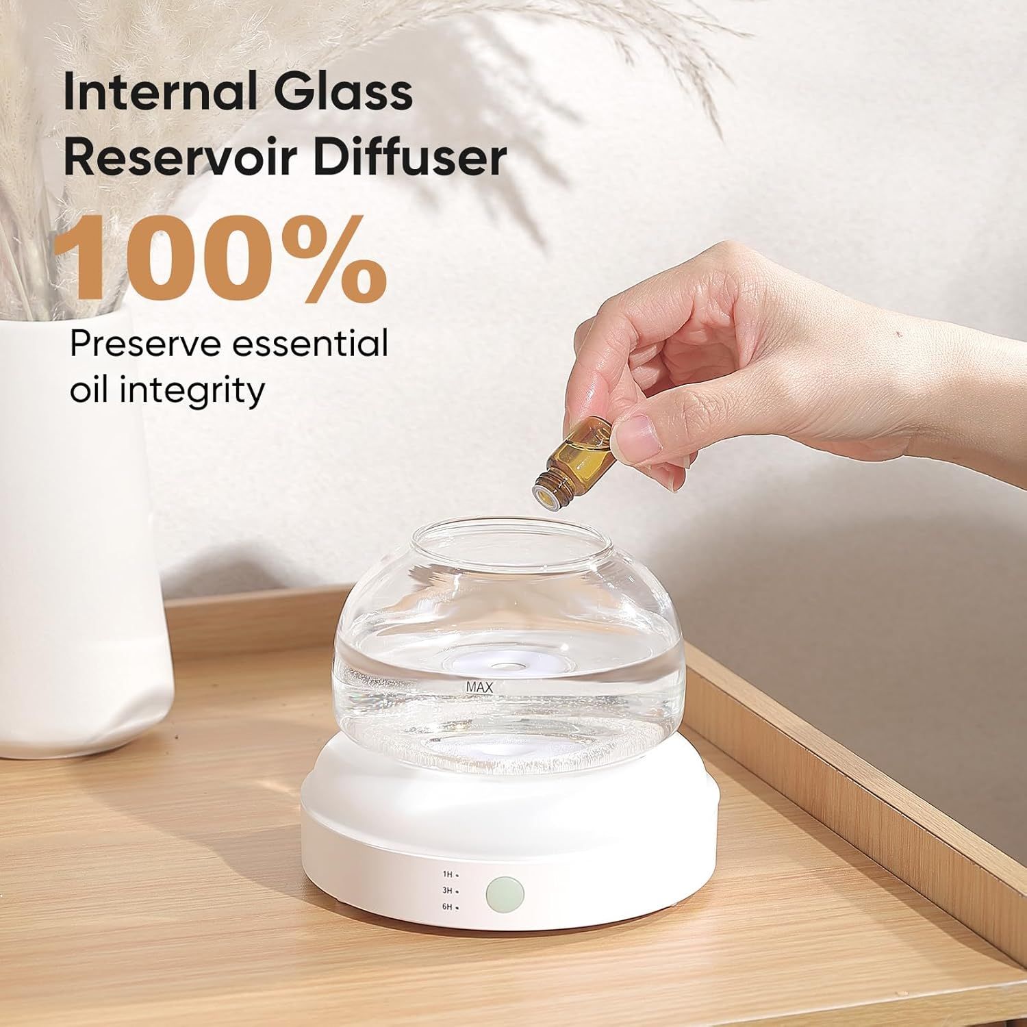 Highlights the internal glass reservoir design that preserves 100% essential oil integrity, reassuring shoppers about product quality and purity.