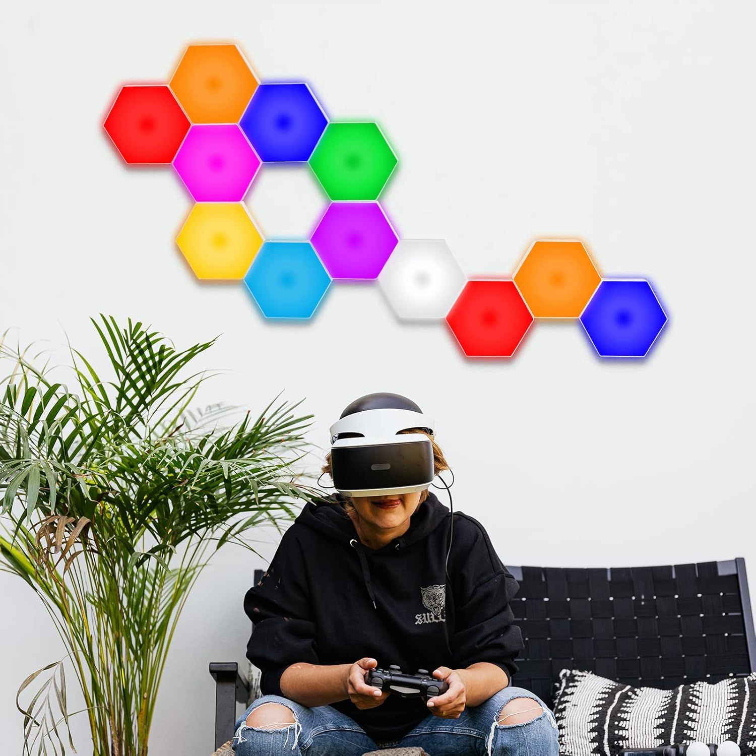Shows the product being used in a real-world home setting to help shoppers visualize how the hexagonal light panels look when installed and how they fit into everyday life.