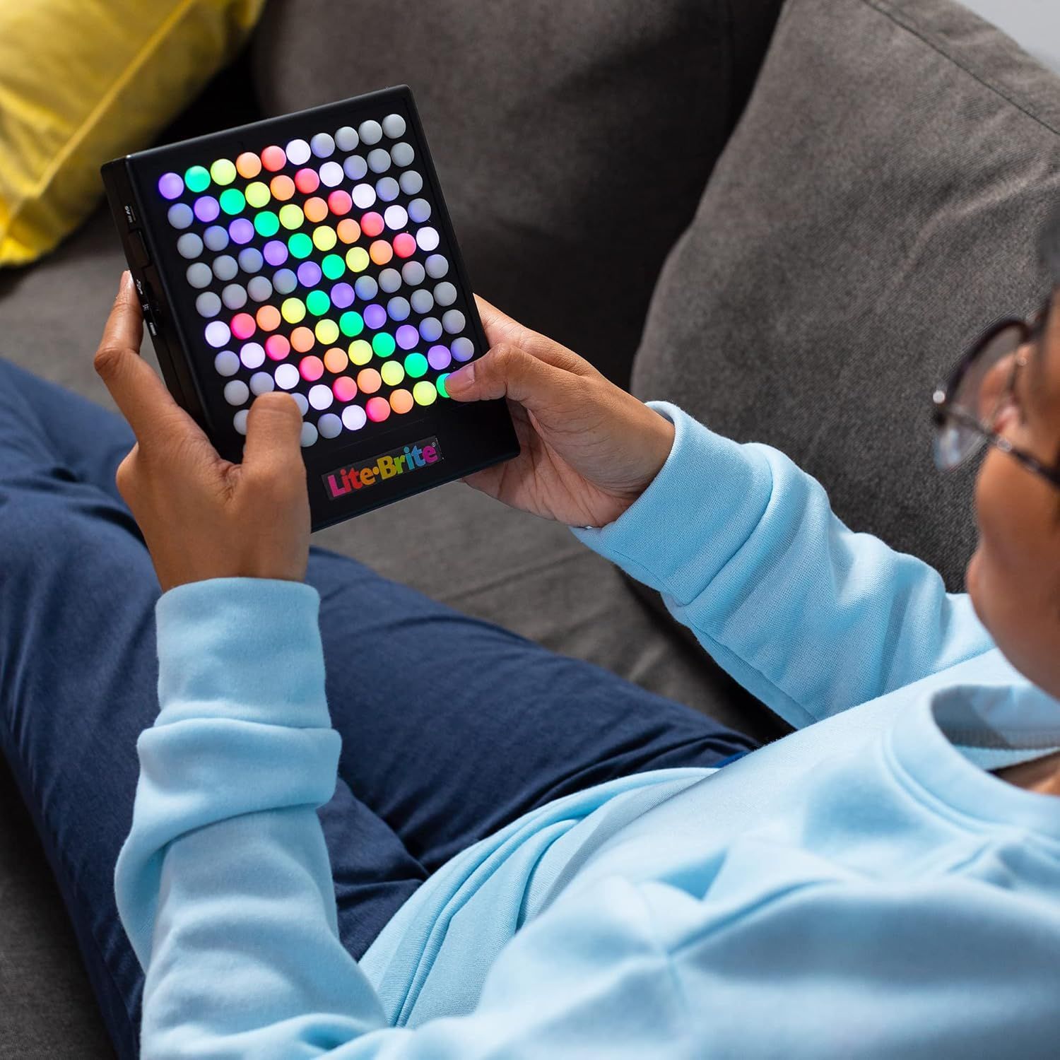 Shows the product being used in a real-world setting to help shoppers visualize how they would interact with and enjoy the product in their own life.