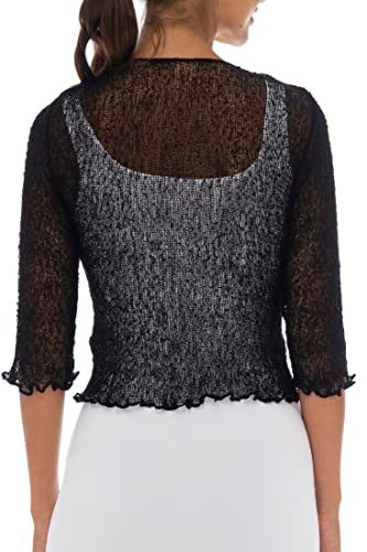 Showcases the delicate lace texture and elegant back design of the garment to communicate style and sophistication.