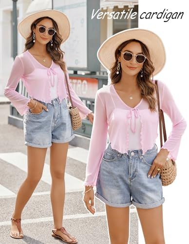 Demonstrates how the pink cardigan can be styled in different ways for various casual and outdoor settings, emphasizing its versatility as a wardrobe staple.