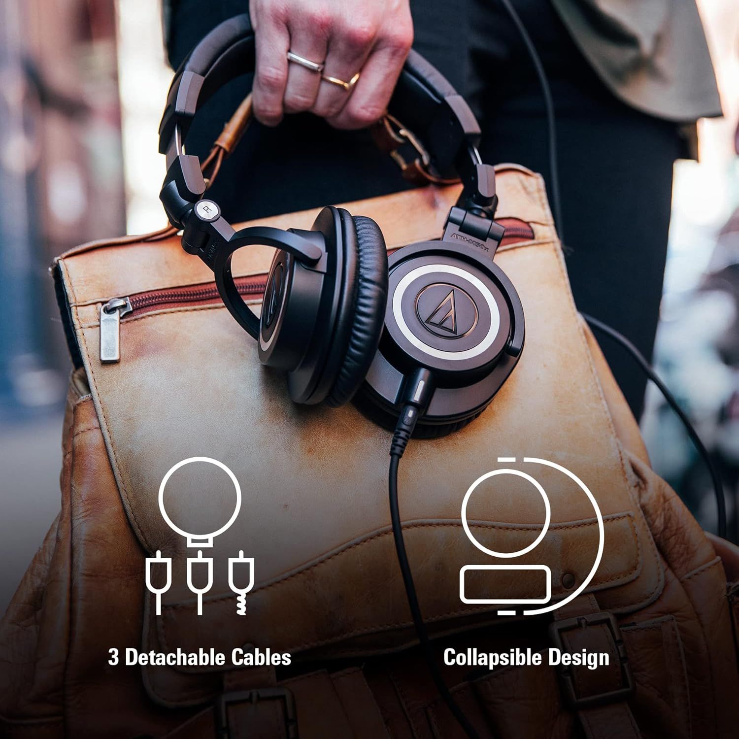 Communicates two key features of the headphones: the versatility of having three detachable cable options and the portability benefit of a collapsible design for easy storage and travel.