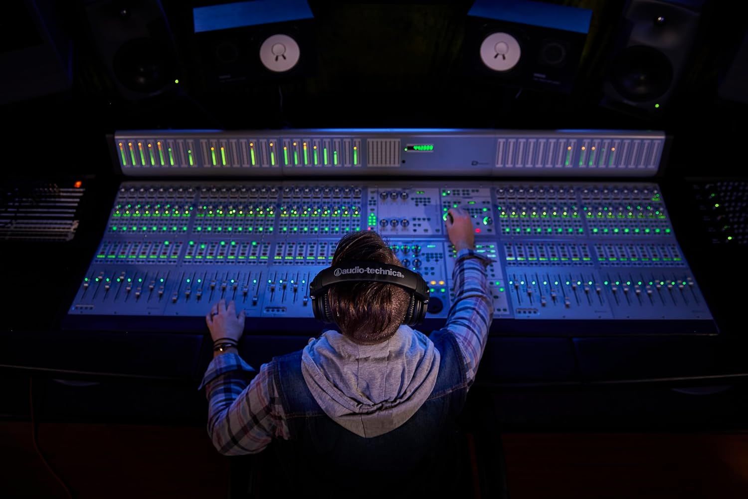 Demonstrates the product in a real-world professional studio setting to show its application in audio production and mixing contexts.