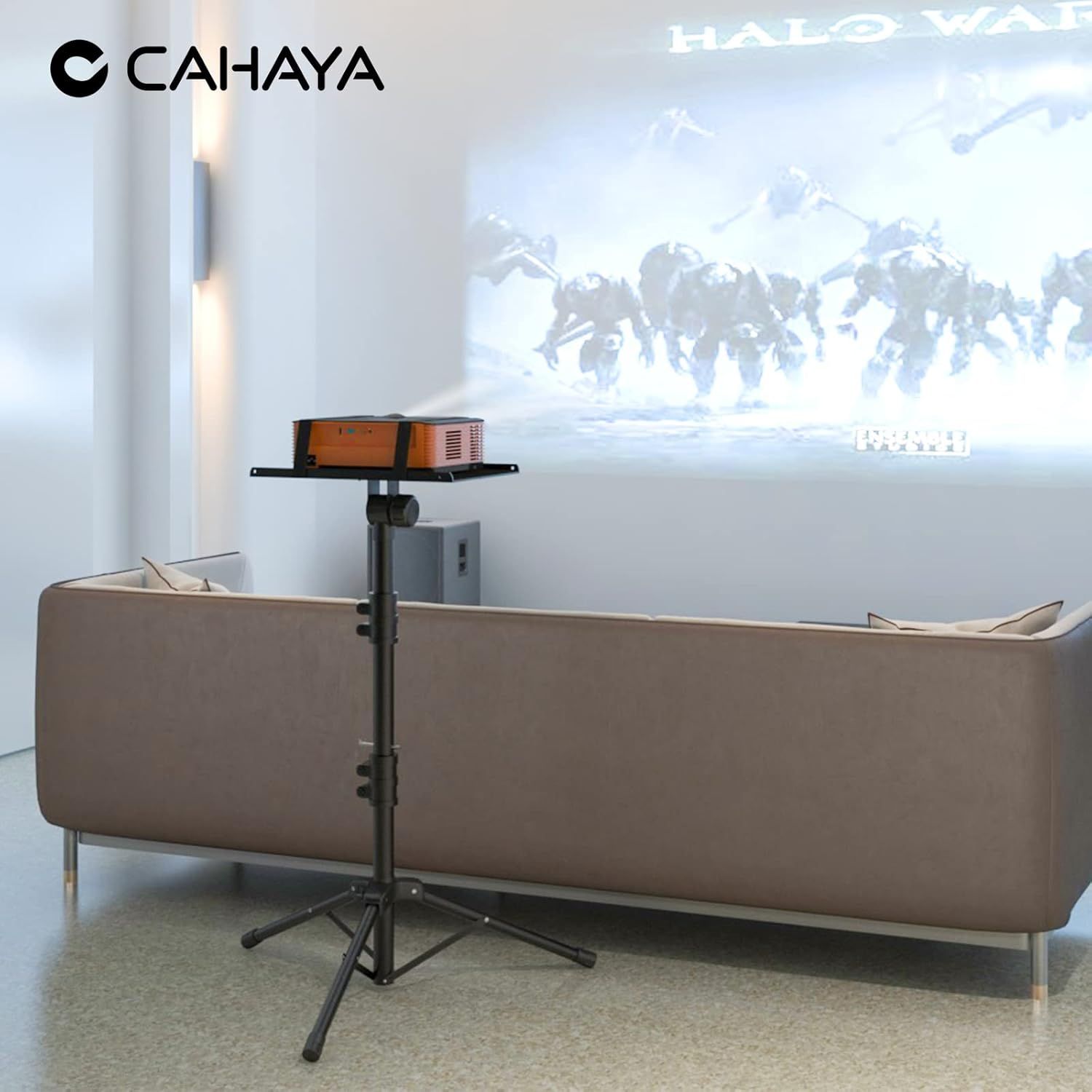 Shows the projector in a real-world living room setting to help shoppers visualize how the product fits into their home and creates a cinema experience.