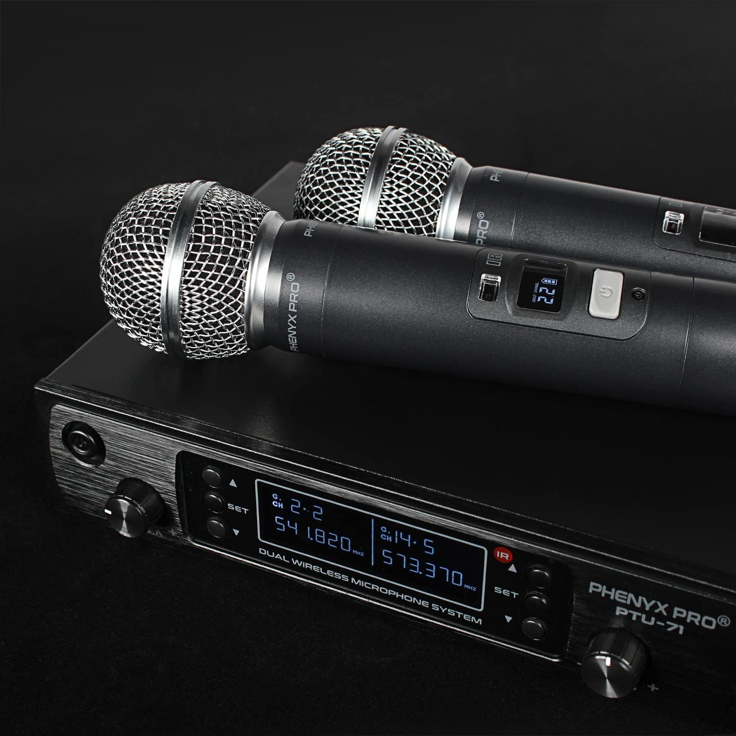 Displays the dual wireless microphone system in a professional context to help shoppers visualize the complete product setup and understand its real-world application.