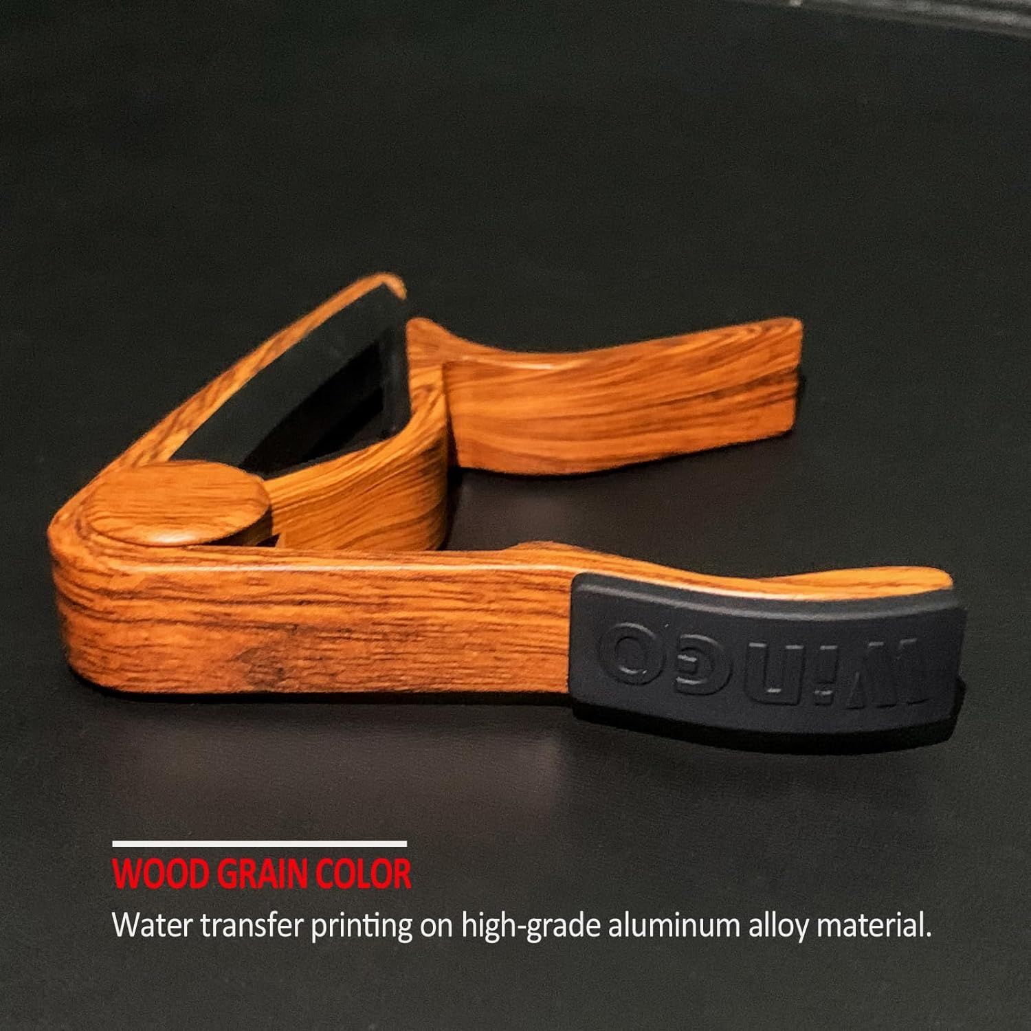 Highlights the premium wood grain aesthetic achieved through water transfer printing on aluminum alloy material to communicate quality and visual appeal.