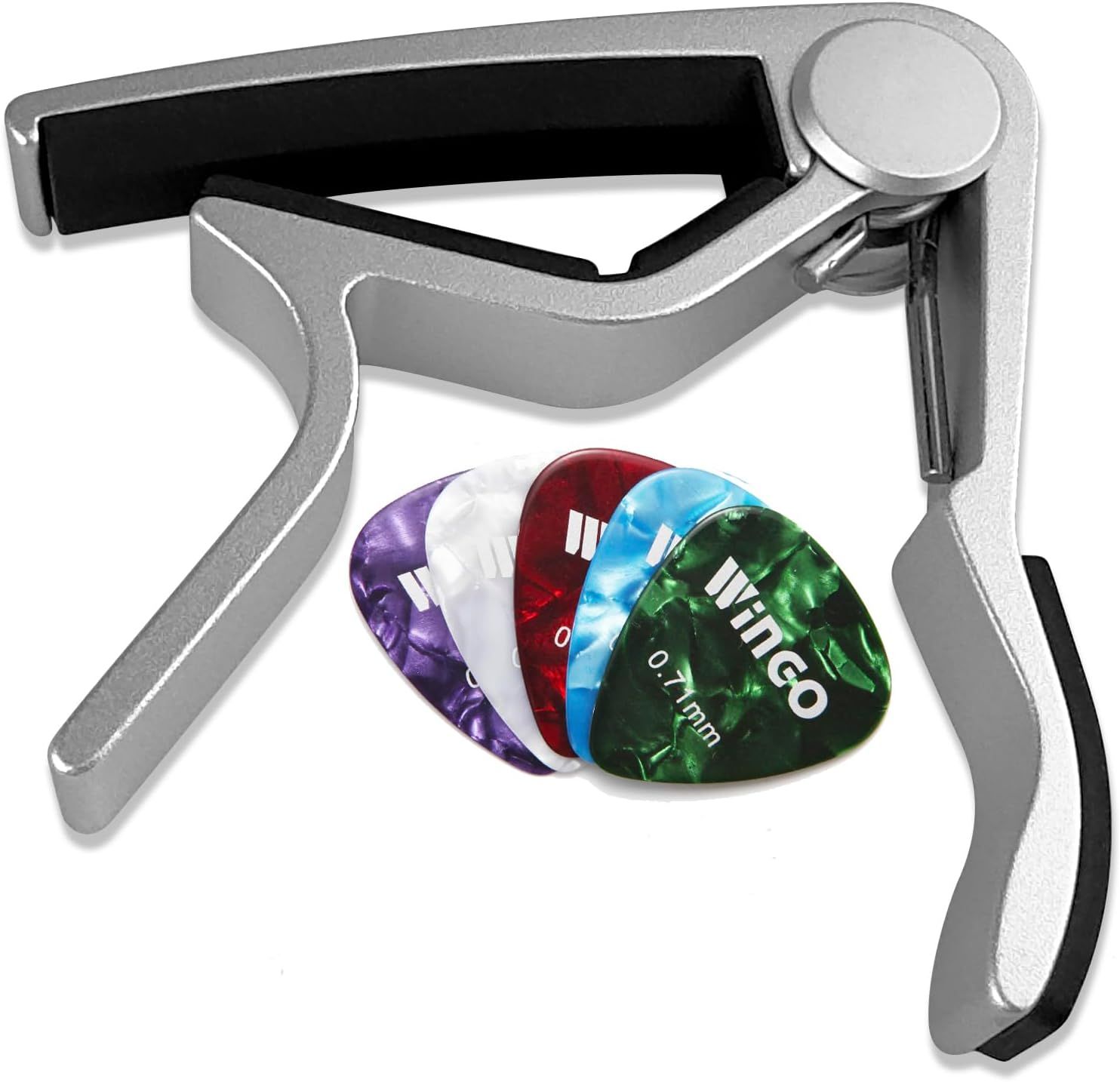 Shows the customer everything included in the purchase: a guitar capo and multiple colorful guitar picks, helping them understand the complete value of the bundle.