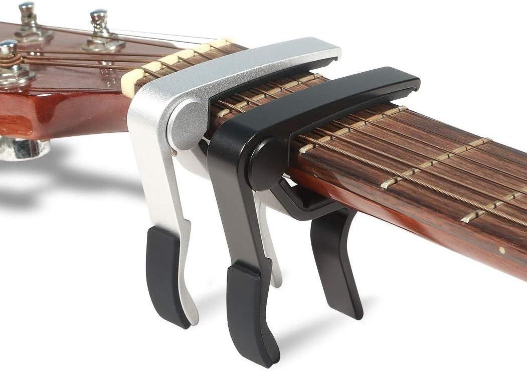 Shows the customer that they receive two guitar capos in different colors (silver and black) with their purchase, demonstrating the value and options included in the package.