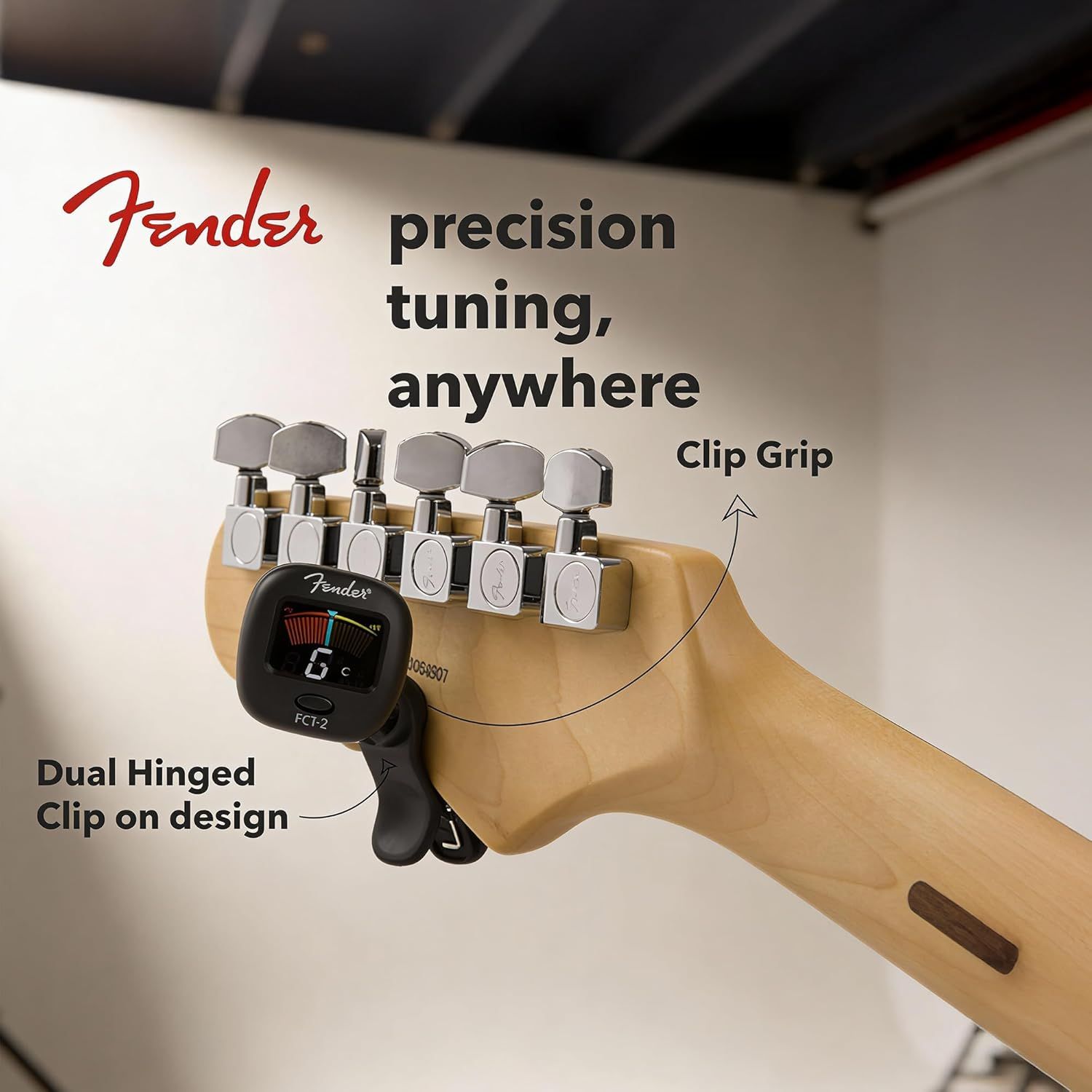 Highlights multiple features of the Fender guitar tuner including its clip grip attachment, dual hinged design, and portability for tuning anywhere.