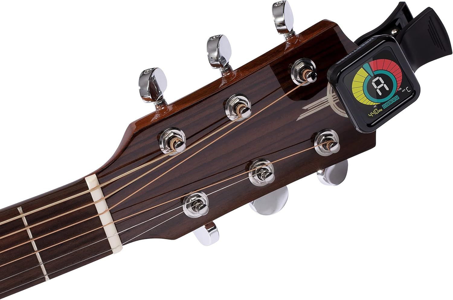 Demonstrates how the clip-on tuner attaches to a guitar headstock, showing shoppers the practical application and ease of use for tuning their instrument.