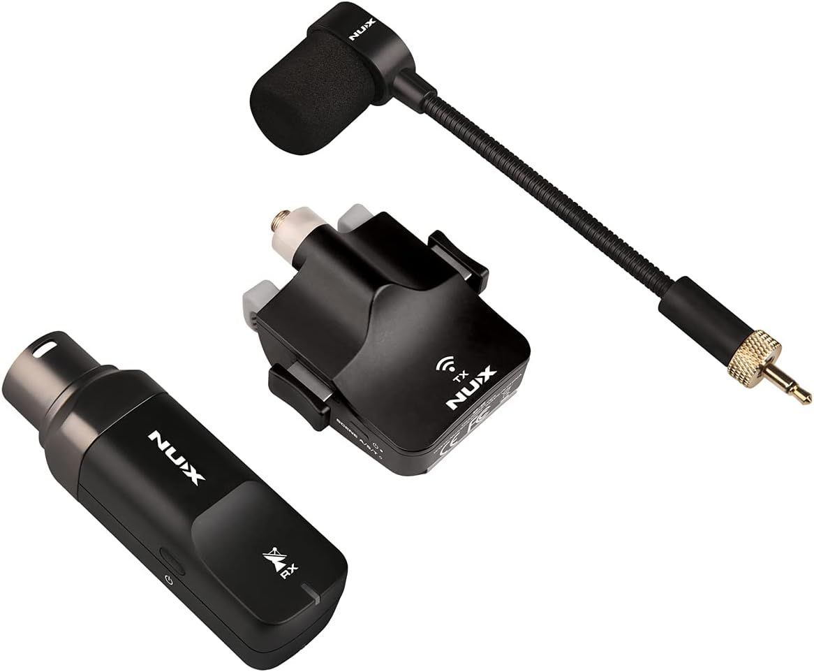 Shows all the components included in the wireless audio system package so shoppers understand what they receive: transmitter, receiver, microphone, and connecting cable.