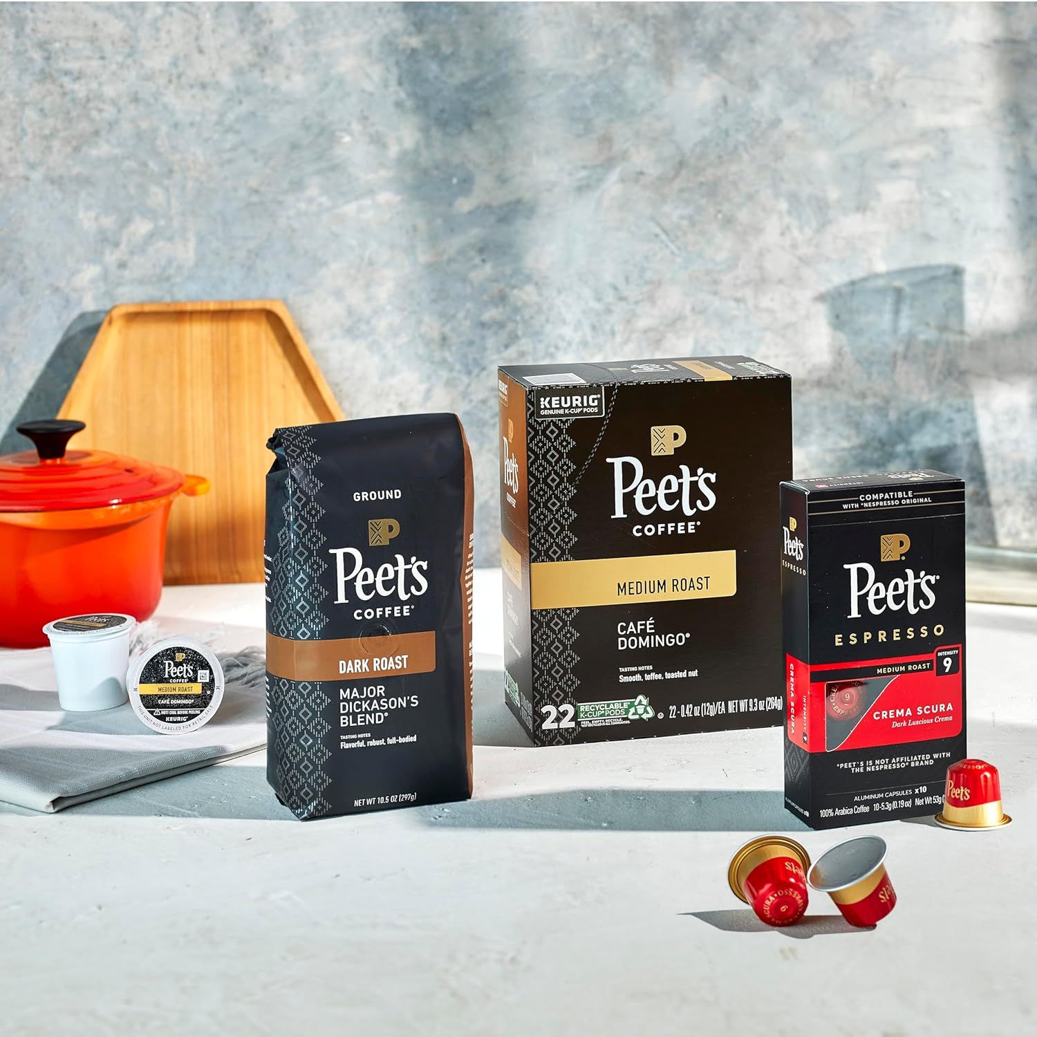 Shows the variety of Peet's Coffee products available including ground coffee, K-cups, and espresso capsules to demonstrate the brand's range and help shoppers understand all purchasing options.