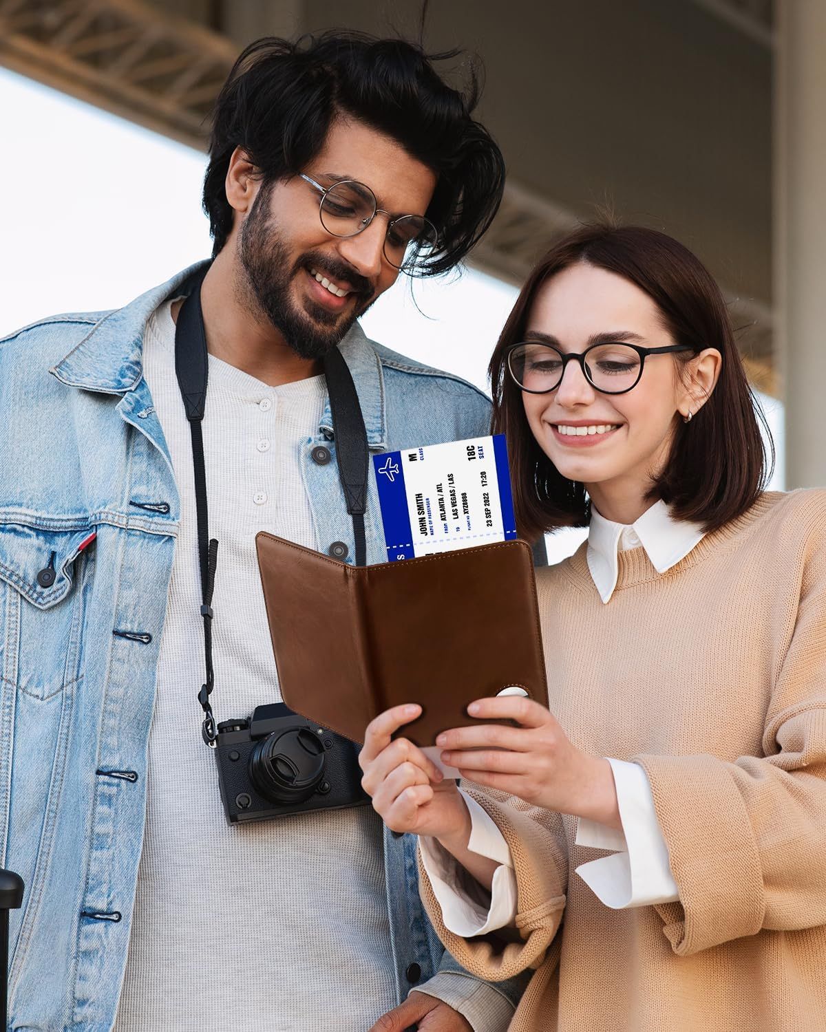 Demonstrates the product is ideal for travelers by showing a couple using it at an airport or travel setting with boarding passes visible.