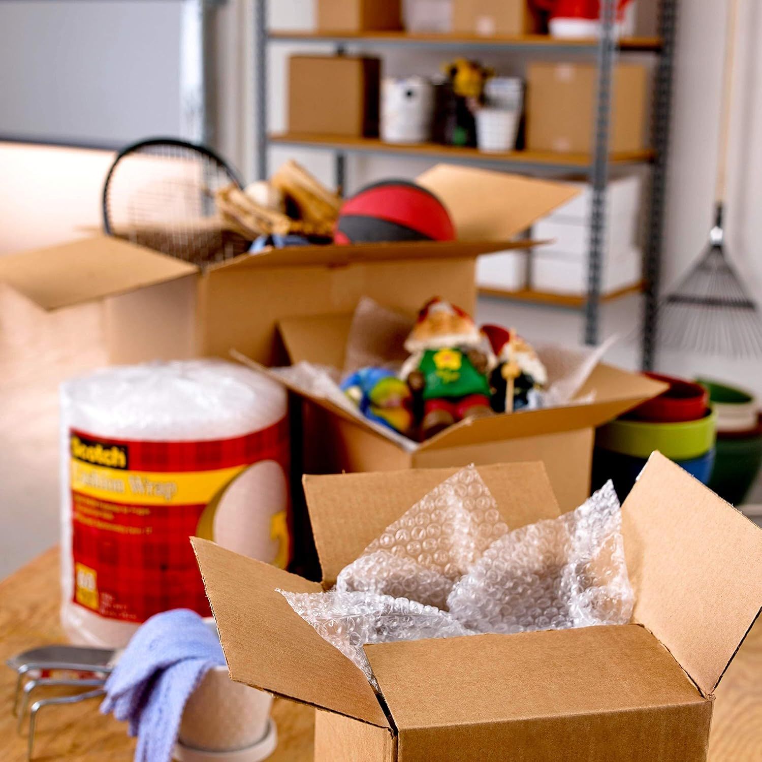Shows the product in a real-world moving or organizing context to help shoppers visualize its use in their own home or relocation scenario.