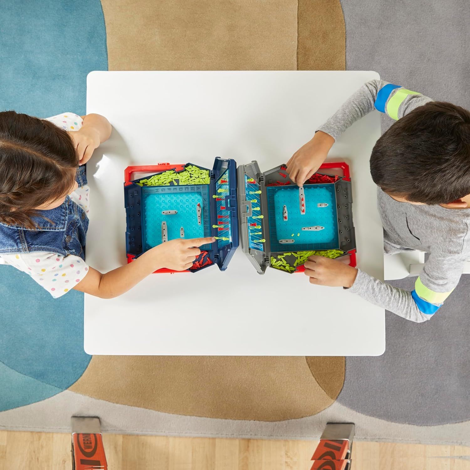Demonstrates the product in a real-world play scenario with two children engaged in the game, showing its social and interactive nature without any text or feature callouts.