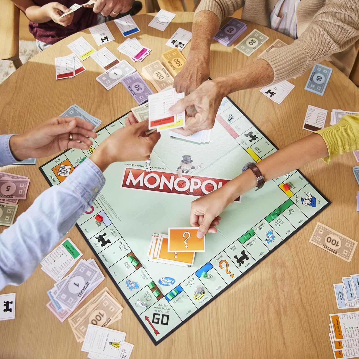 Demonstrates the product being enjoyed in a real-world social setting to convey the fun, engaging, and family-friendly nature of the game.
