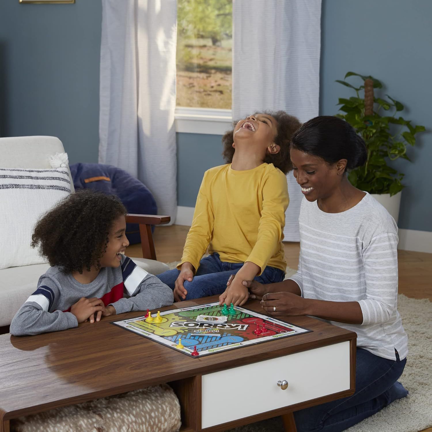 Showcases the product being enjoyed in a real-world home setting to help shoppers visualize the product in use and connect emotionally with the family-friendly experience it provides.