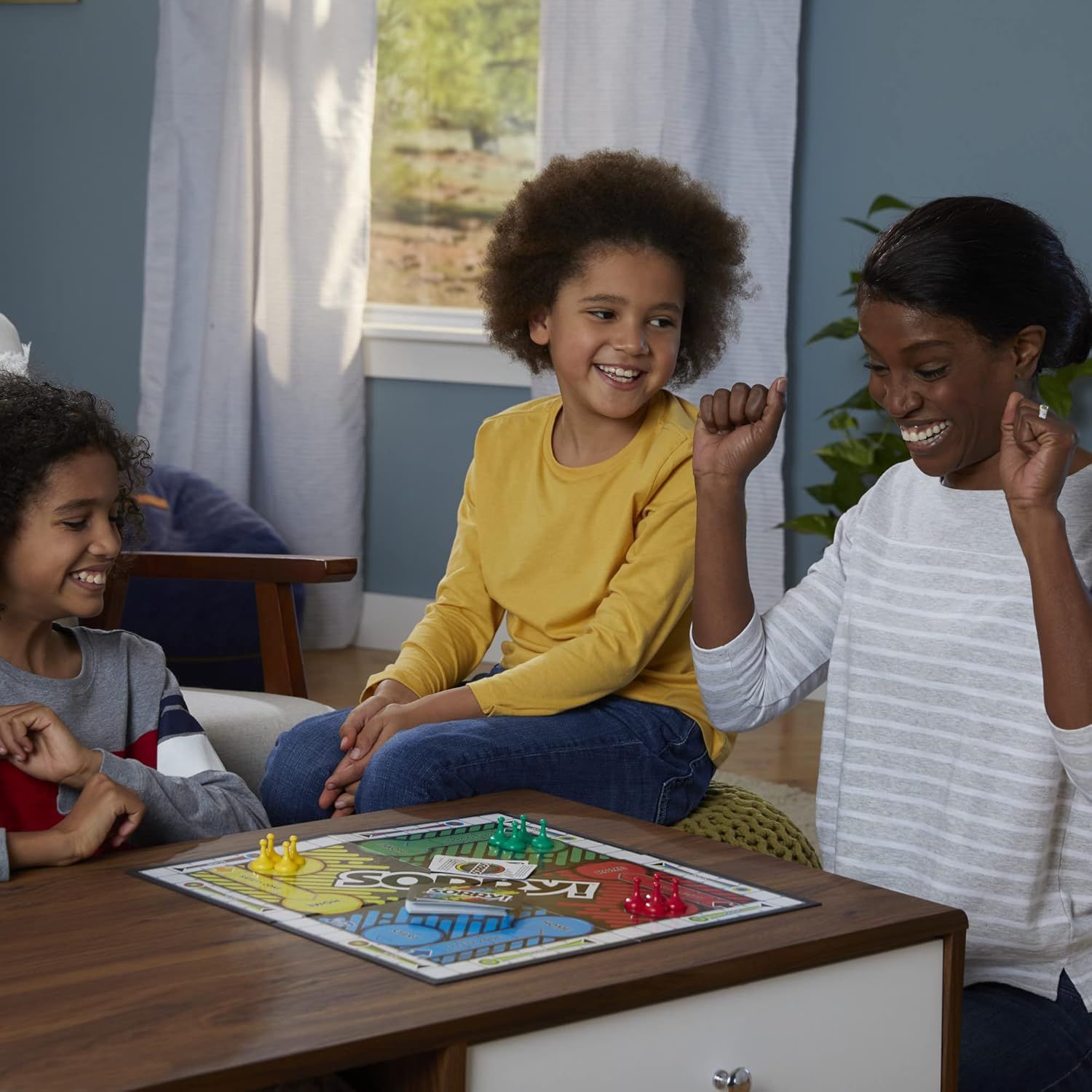 Demonstrates the product in a real-world home setting to show how it brings families together for fun and entertainment.