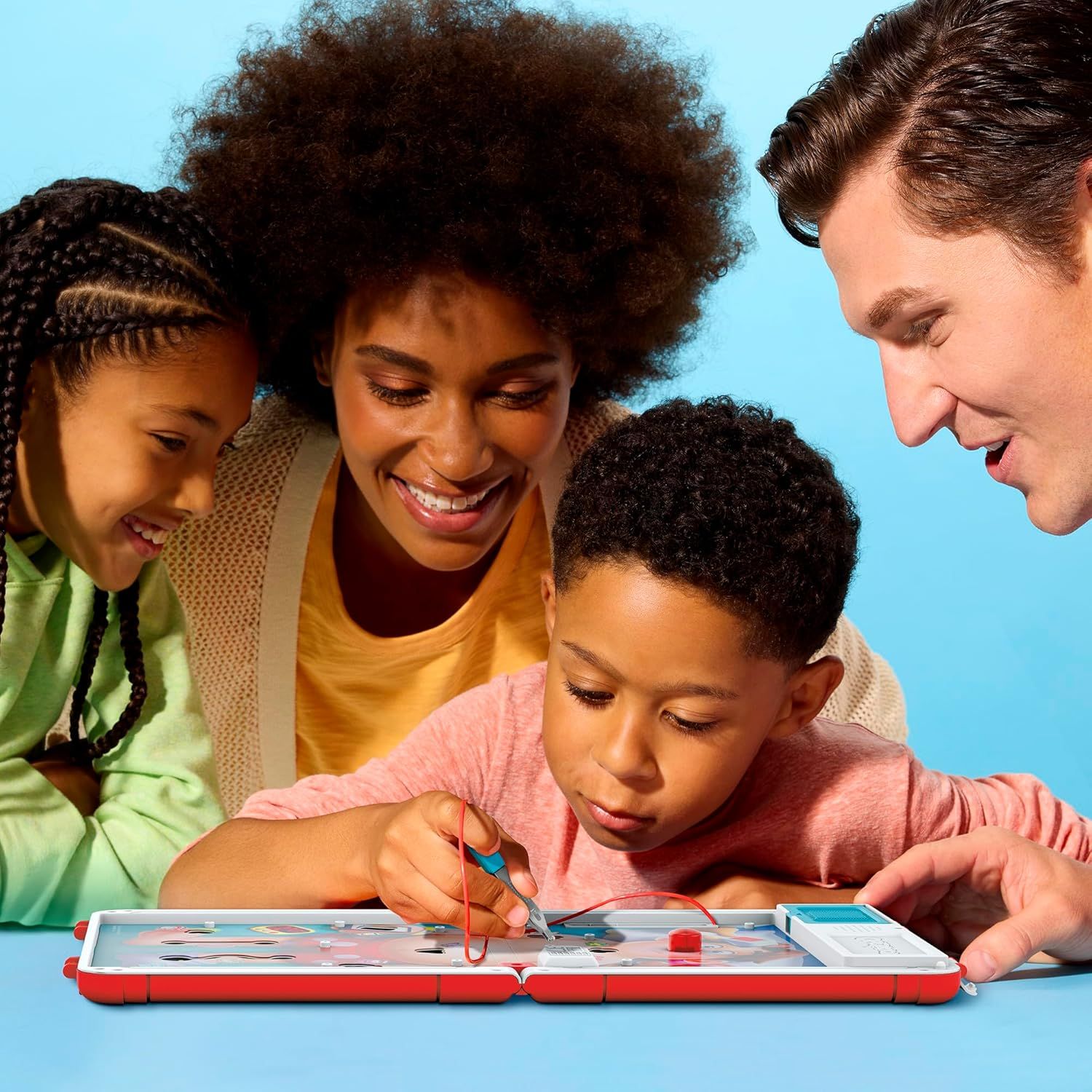 Shows the product being enjoyed by a family in a real-world context, demonstrating its appeal for children and parents engaging together in creative or educational activities.