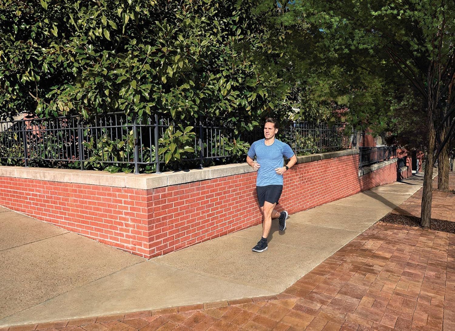 Demonstrates the product in a real-world outdoor exercise context, showing its suitability for active lifestyles and running activities.
