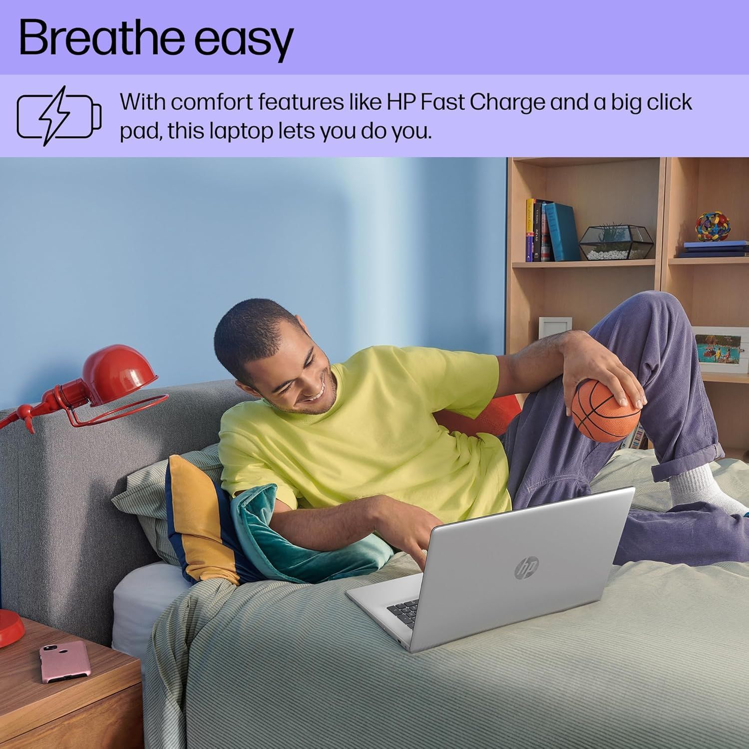 Communicates multiple comfort and convenience features of the laptop (fast charging and large clickpad) to position it as a stress-free, user-friendly device for everyday use.