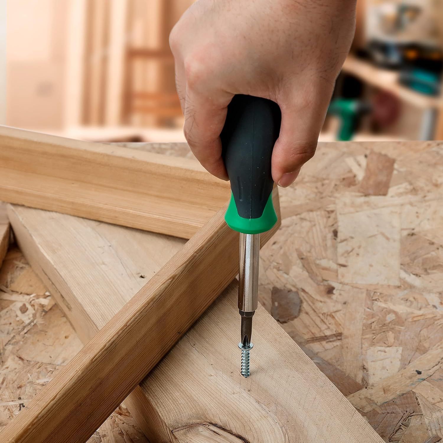 Demonstrates how to use the screwdriver tool for assembly or woodworking tasks, reassuring shoppers that the product is straightforward to use in real-world applications.