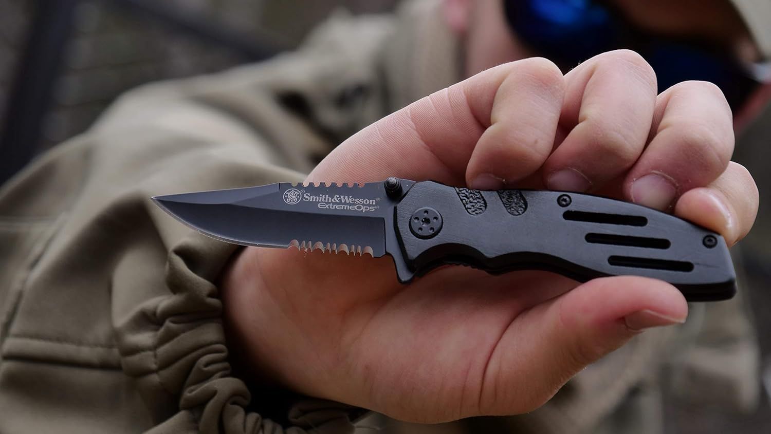 Shows the product in a real-world setting being held by a user to help shoppers visualize the knife's size, appearance, and how it looks in actual use.