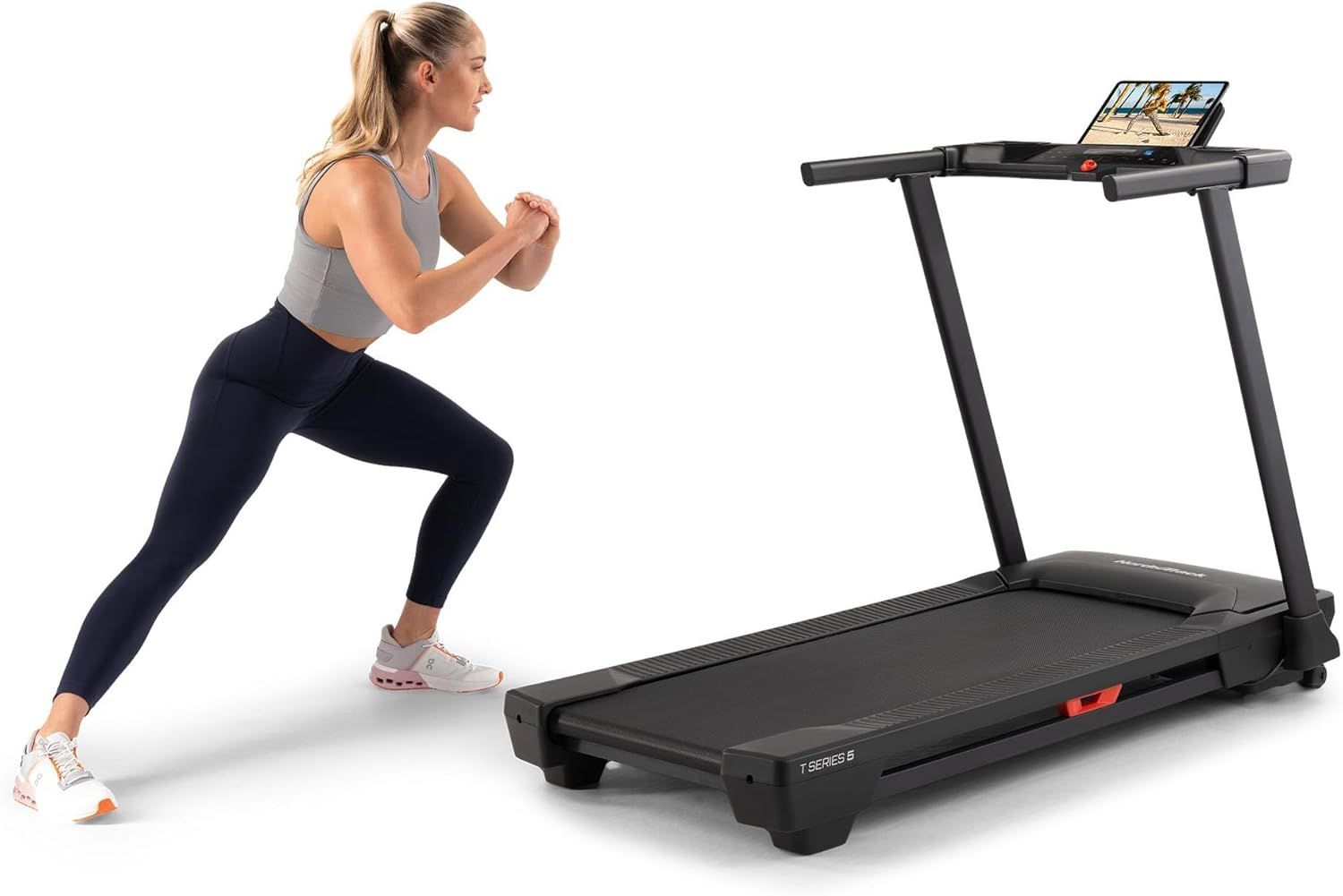 Shows the treadmill being used in a real-world home workout setting to help shoppers visualize the product in their own space and understand its practical application.