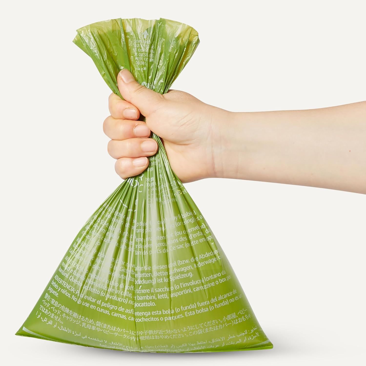 Demonstrates the product's environmentally responsible design by showing a green biodegradable bag with safety warnings, reassuring shoppers that it's safe and sustainable. Highlights the product's…