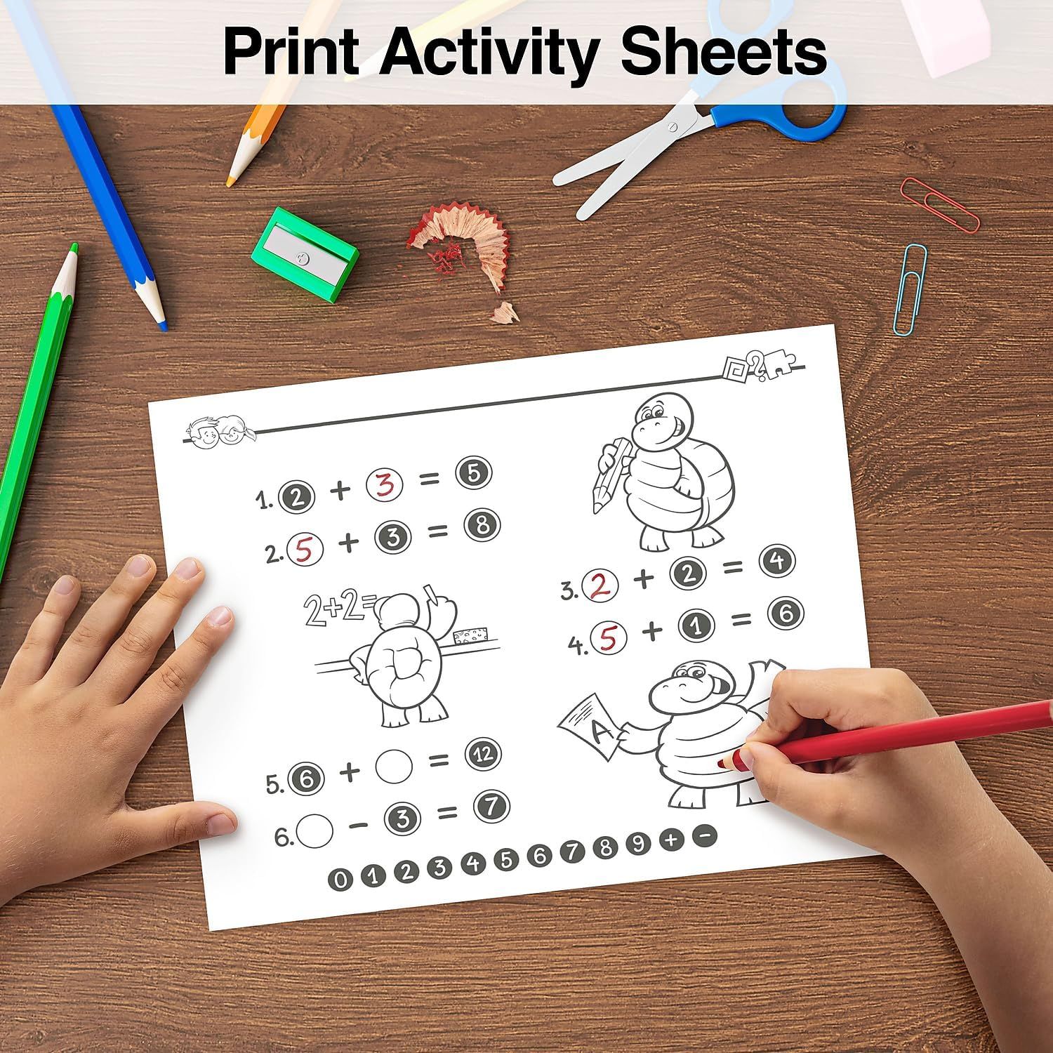 Shows the product being used in a real-world educational context with children's hands actively engaging with the activity sheet, demonstrating practical application and appeal to parents.