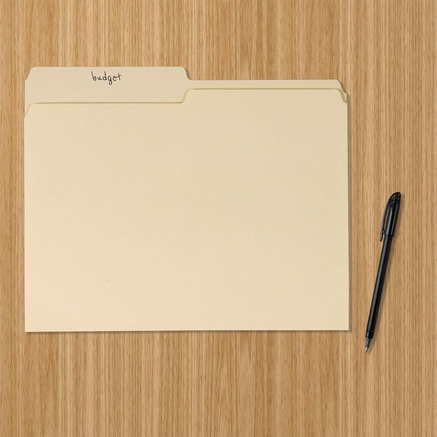 Displays the product in a real-world office or home setting to help shoppers visualize how the file folders can be used for organizing documents.