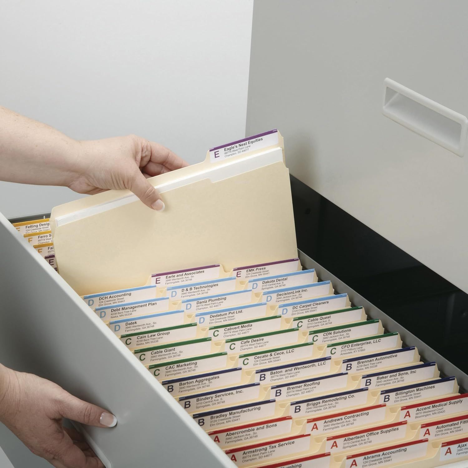 Demonstrates the product in a real-world office context, showing how the filing system organizes documents alphabetically for easy access and retrieval.