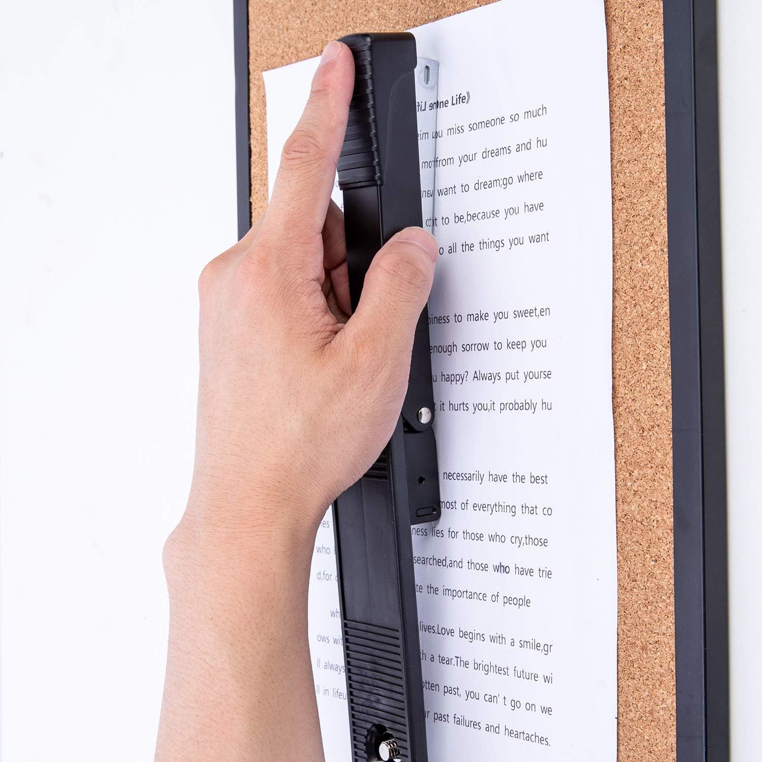 Demonstrates the product's handheld portability and ease of use for scanning documents in a real-world context, reassuring shoppers that it's simple and convenient to operate.