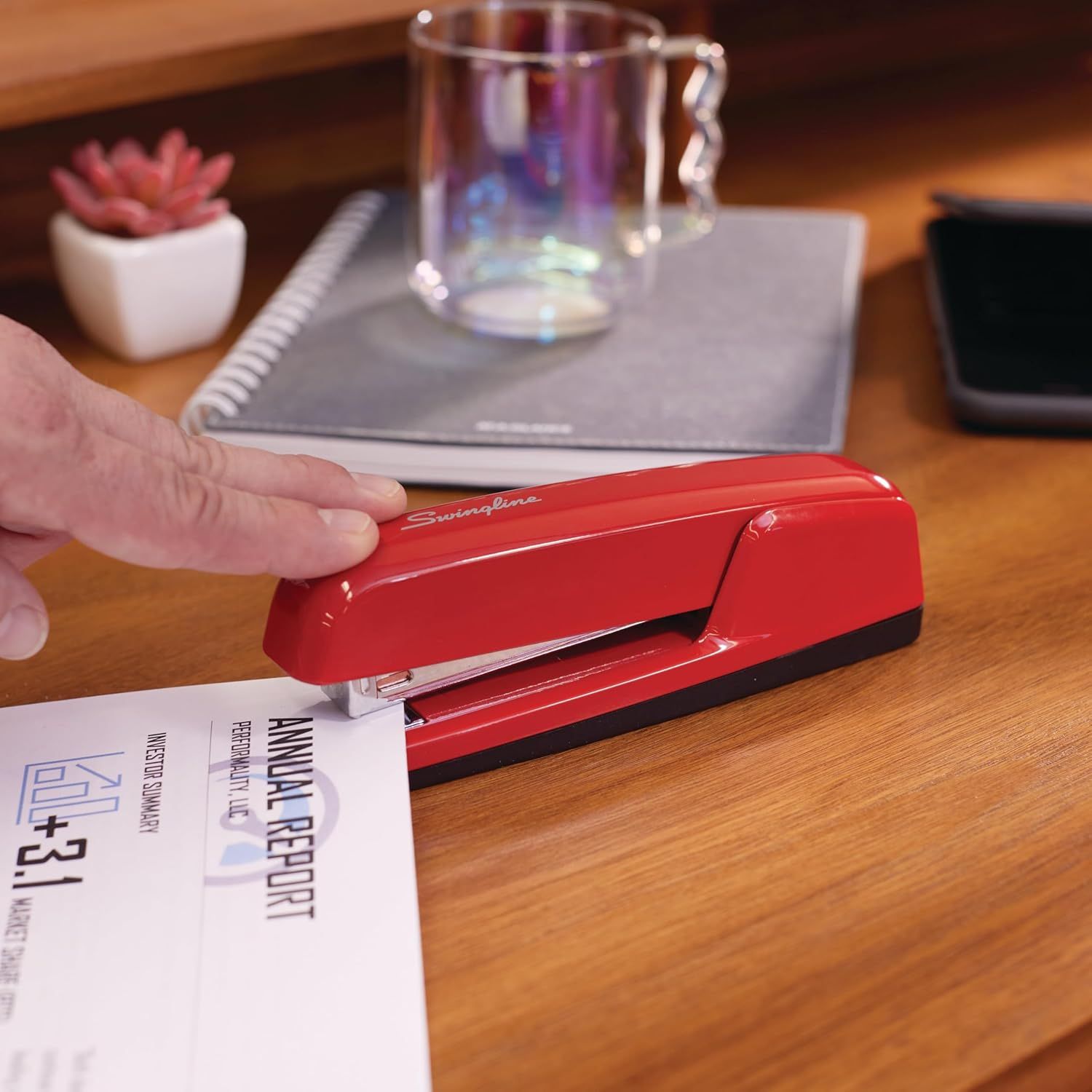 Demonstrates the product in a real-world office or home setting to help shoppers visualize how it fits into their daily workspace.