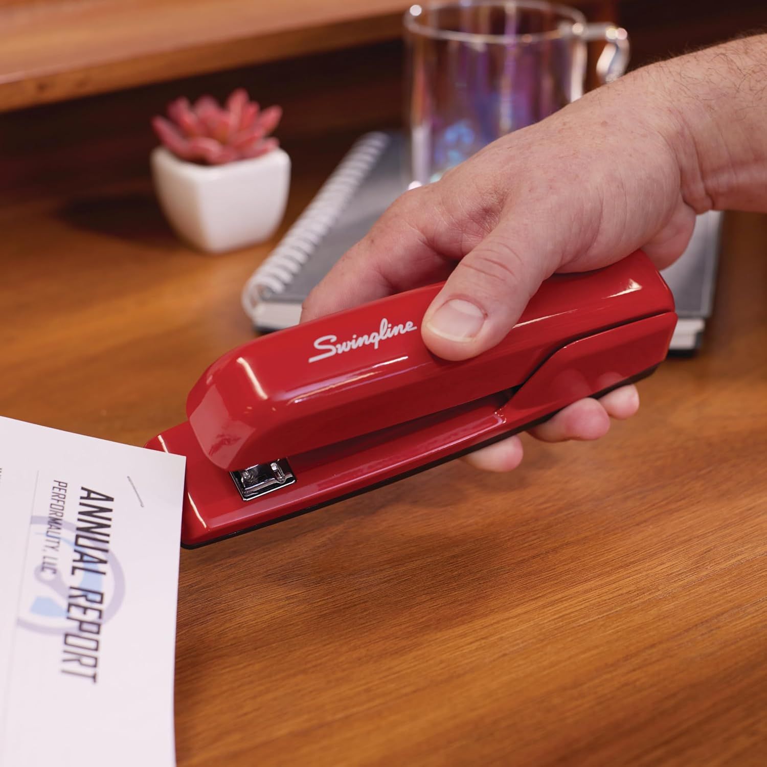 Demonstrates the product in a real-world office or home setting to help shoppers visualize how it fits into their everyday workspace.
