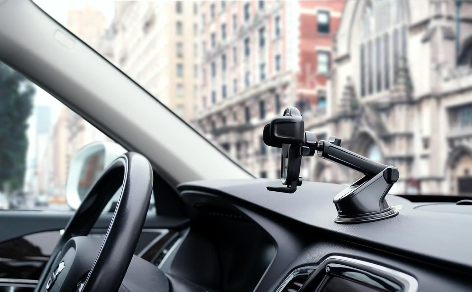Demonstrates the product in a real-world driving context, showing how the phone mount naturally fits on a car dashboard without any text or feature callouts.