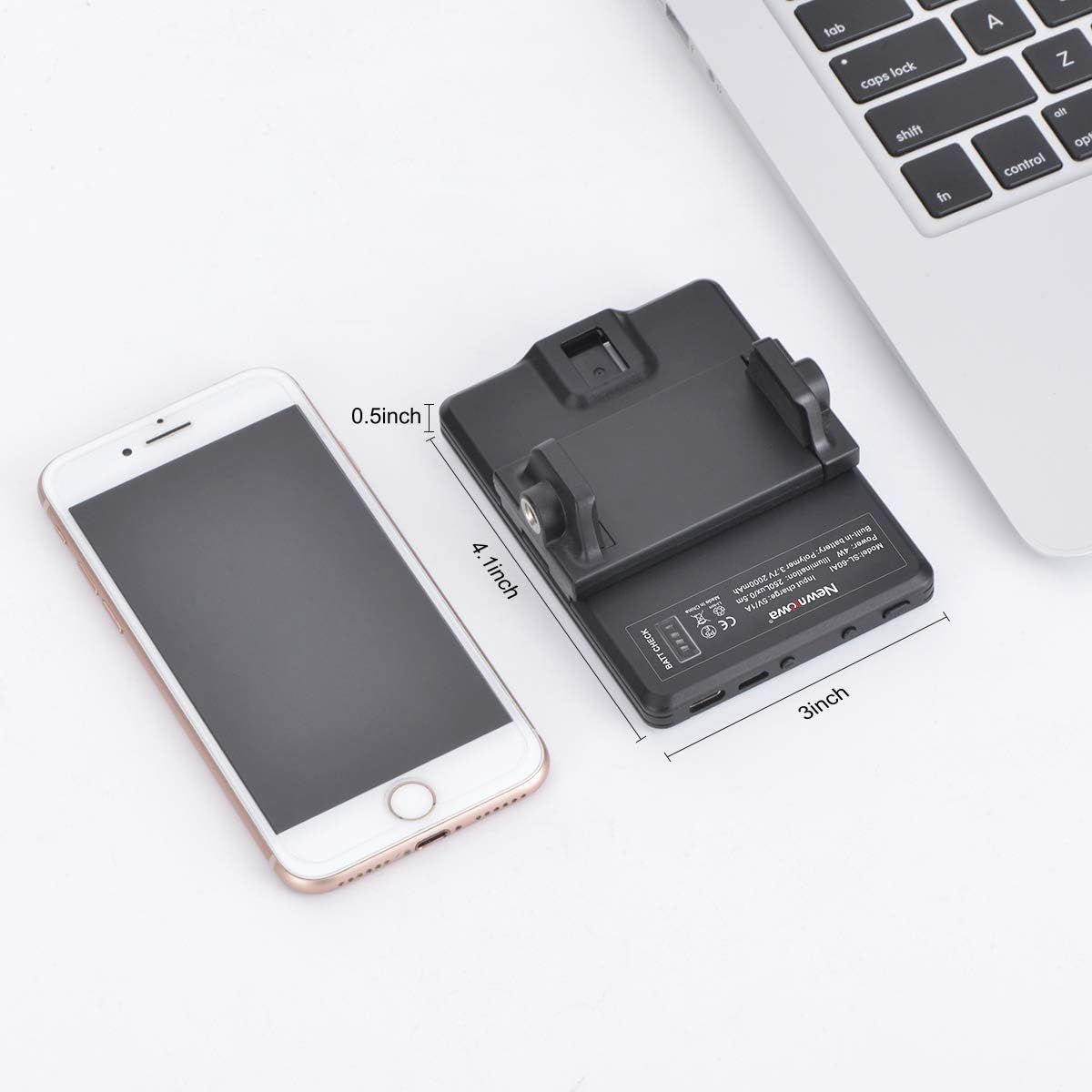 Demonstrates the physical size of the product using exact measurements (4.1 inch x 3 inch x 0.5 inch) with a smartphone for scale, helping shoppers understand how compact and portable the device is.