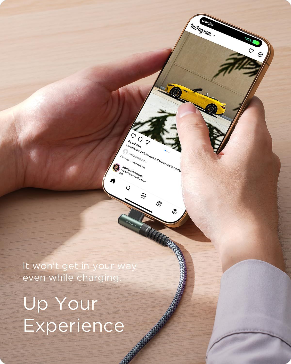 Demonstrates that the charging cable is designed to stay out of the way during phone use, allowing users to comfortably browse and interact with their device while charging.