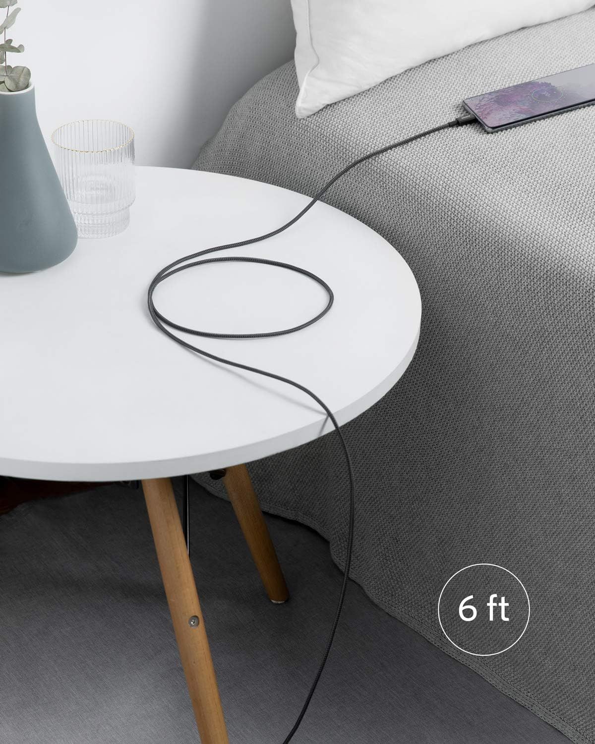 Communicates that the charging cable is 6 feet long, reassuring shoppers they'll have sufficient reach from outlet to bedside or other use locations. Shows the product in a real-world bedroom…