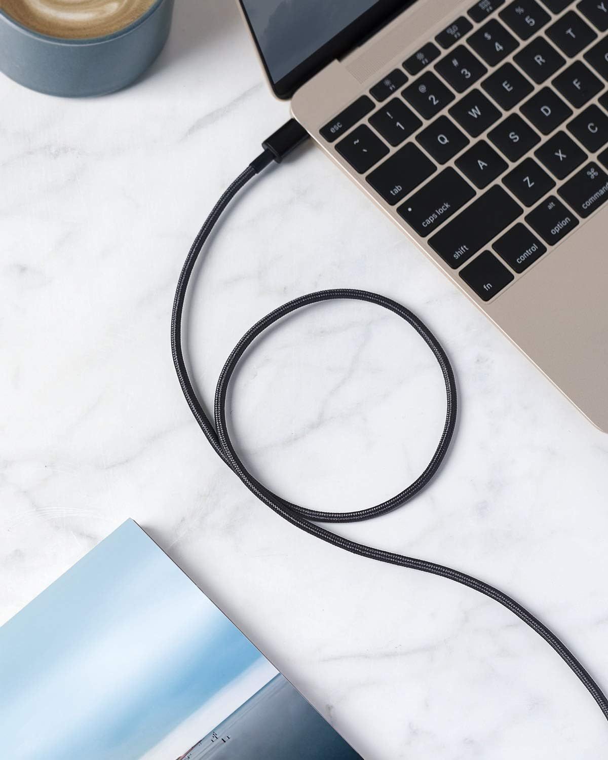 Demonstrates the product in a real-world professional environment to help shoppers visualize how the cable fits into their daily work routine.