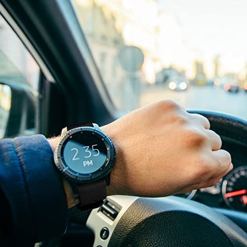 Demonstrates the product being worn in a real-world driving context to help shoppers visualize how the smartwatch fits into everyday life.