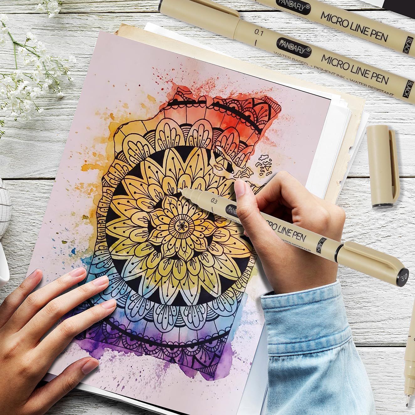 Shows authentic customer use of the micro line pens through a real DIY art project, building trust and demonstrating the product's capability for detailed artistic work.