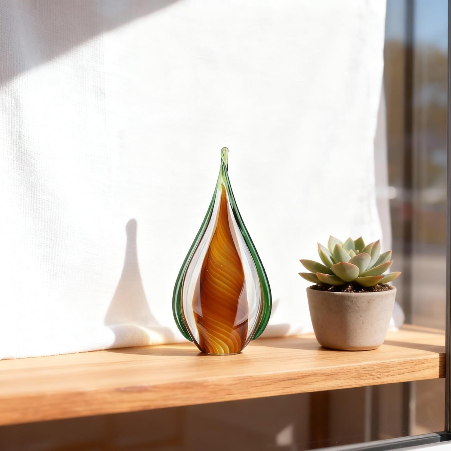 Showcases the decorative glass art piece in a real-world home setting to help shoppers visualize how it would look on their own shelf or table.