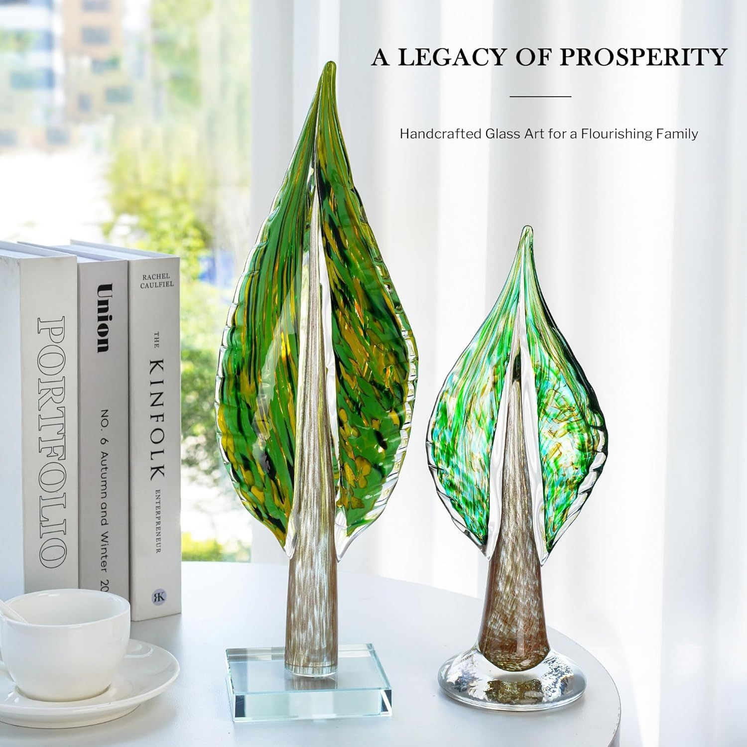 Showcases the glass art pieces in an elegant home setting to help shoppers visualize the product as sophisticated decor that enhances their living space.