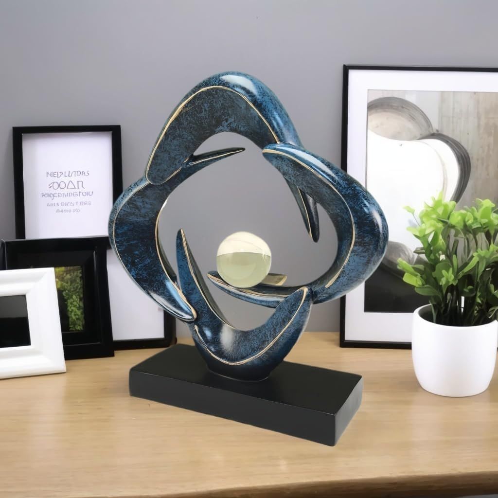 Showcases the decorative sculpture in a real-world home setting to help shoppers visualize how the product would look styled on a shelf or table in their own space.
